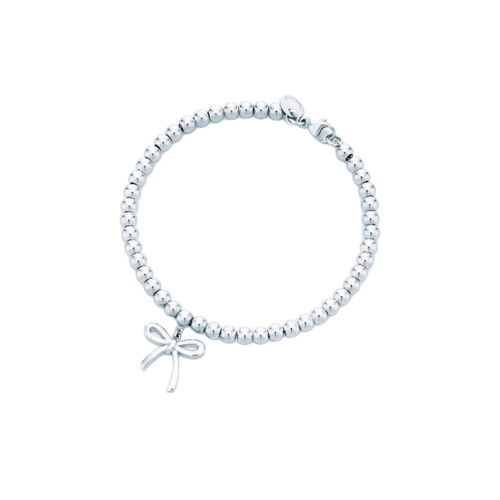 PULSERA CON INSIGNIA DE MOÑO SILVER