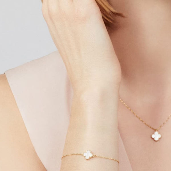 PULSERA ONE TRÉBOL GOLD WHITE