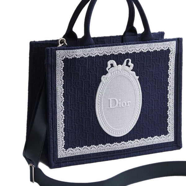 BOLSO CD BOOK TOTE BANDOLERA