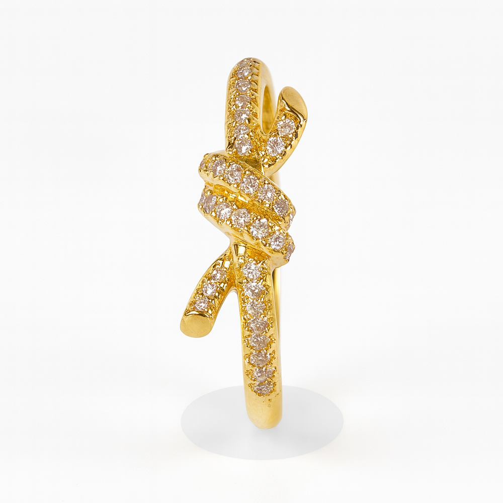ANILLO KNOT CON ZIRCONIAS T GOLD