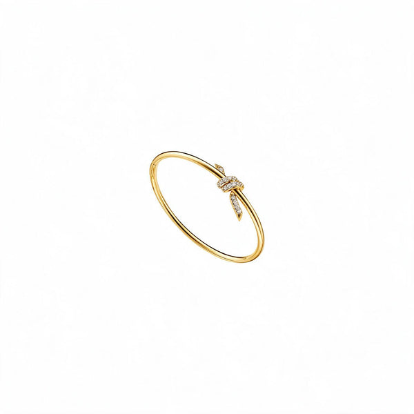 PULSERA T KNOT DELGADA GOLD ZIRCONIAS