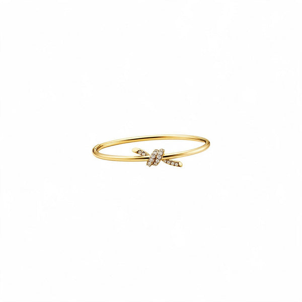 PULSERA T KNOT DELGADA GOLD ZIRCONIAS